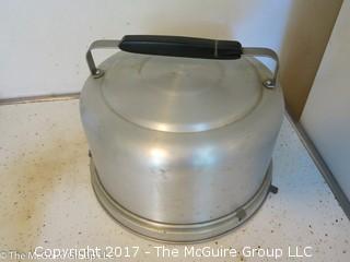 Collection of kitchenware including covered baking pots, and an aluminum pie/cake carrier