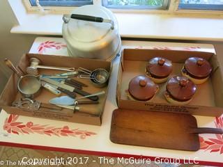 Collection of kitchenware including covered baking pots, and an aluminum pie/cake carrier