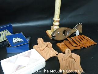 Group of Decorative Items.  Includes Alabaster Lidded Box, Two Terracotta Clay Angels, Set of Wood Coasters, Wood Candle Stick and Wood Fish Shaped Bottle Holder and Box Set of Lacquer Coasters.  