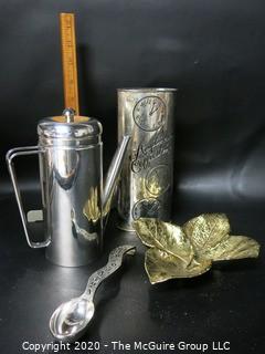 Group of 4 Metal ware Items.  Includes Silver Plate Coffee Server from Italy, Silver Plate Neiman Marcus Cannister and Spoon and Brass Virginia Metalcrafters Leaf Dish.  