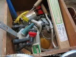 Assortment of tools including mitre box, bench brush and pair of VW hubcaps 