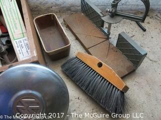 Assortment of tools including mitre box, bench brush and pair of VW hubcaps 