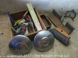 Assortment of tools including mitre box, bench brush and pair of VW hubcaps 