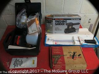 Assortment of tools including NIB Wagner paint sprayer, B & D Finishing Sander, Craftsman Torque Wrench and Weller Soldering Gun 