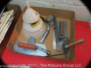 Assorted tool room supplies including bins, sandpaper, funnels and masonry tools 