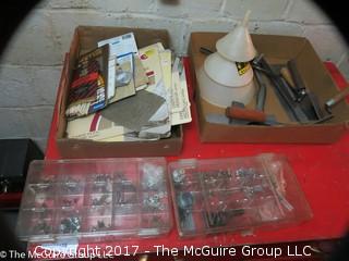 Assorted tool room supplies including bins, sandpaper, funnels and masonry tools 