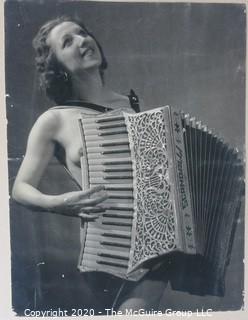 Photo: Print: Erotica: Nude Accordian Player submitted by Boris Dobro to photo contest 1941.  Measures approximately 16" x 20". 