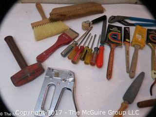 Assortment including paint brushes, screwdrivers, stapler, sledge hammer metal files, metal punches, wall paper tools, plumb bob.... 