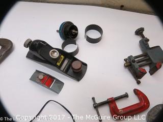 Tools including new and old pipe wrenches, Dremel type tool, C clamps, hole saws, planes, ....