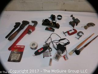 Tools including new and old pipe wrenches, Dremel type tool, C clamps, hole saws, planes, ....