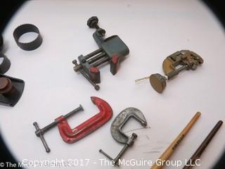 Tools including new and old pipe wrenches, Dremel type tool, C clamps, hole saws, planes, ....