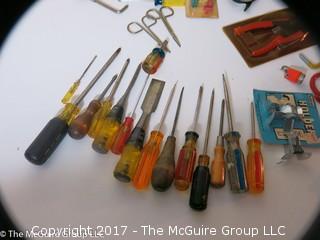 Tools including screwdrivers, wire strippers, tin snips, putty knives, alan wrenches, riveting tool, ...