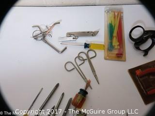 Tools including screwdrivers, wire strippers, tin snips, putty knives, alan wrenches, riveting tool, ...