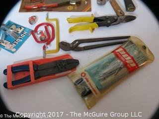 Tools including screwdrivers, wire strippers, tin snips, putty knives, alan wrenches, riveting tool, ...