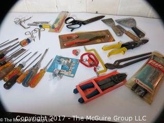 Tools including screwdrivers, wire strippers, tin snips, putty knives, alan wrenches, riveting tool, ...