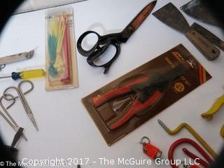 Tools including screwdrivers, wire strippers, tin snips, putty knives, alan wrenches, riveting tool, ...