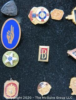 Group of pins; includes school, girl scouts, sports, masons & company service pins.