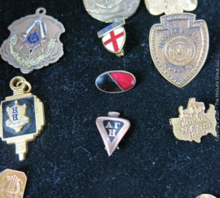 Group of pins; includes school, girl scouts, sports, masons & company service pins.