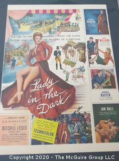 1944 Movie Poster - Lady in the Dark Staring Ginger Rogers. Measures approximately 12" x 15 1/2" with Mat.