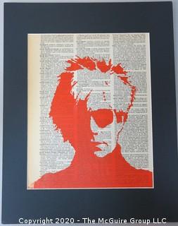 Silkscreen Of Andy Warhol in Orange on Dictionary Page by Nikolas Grabovskiy (?).  Measures approximately 11" x 14" with mat.