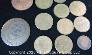 Group of 12 Miscellaneous Tokens; Includes Brothel Token and Game Tokens.