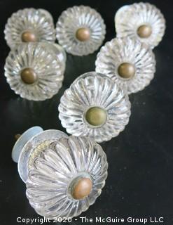 Set of 7 Antique Glass Door Knobs in Scallop Design with Brass Fittings.