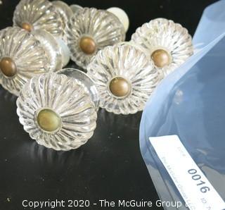 Set of 7 Antique Glass Door Knobs in Scallop Design with Brass Fittings.