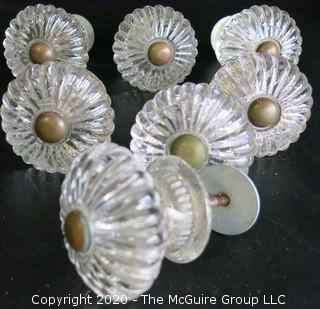 Set of 7 Antique Glass Door Knobs in Scallop Design with Brass Fittings.