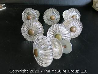 Set of 7 Antique Glass Door Knobs in Scallop Design with Brass Fittings.