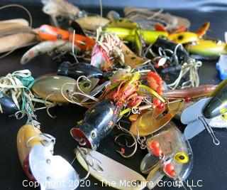 Large Group of Fishing Lures in a Variety of Shapes, Colors and Materials.