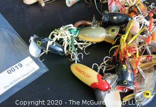 Large Group of Fishing Lures in a Variety of Shapes, Colors and Materials.