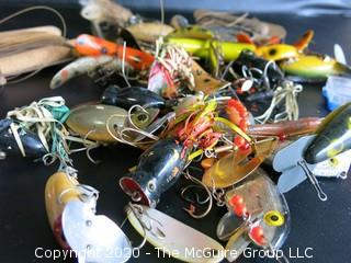 Large Group of Fishing Lures in a Variety of Shapes, Colors and Materials.