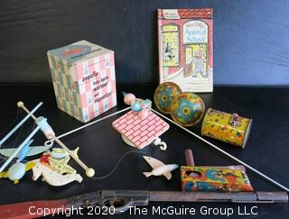 Group of Vintage Children's Toys and Mobile.
Includes Metal Toy Rifle & Three Pressed Tin Noise Makers, 