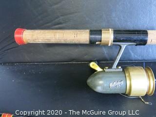 Vintage Holiday 40 Fishing Spinning Reel and 75" Fly Fishing Rod. 
