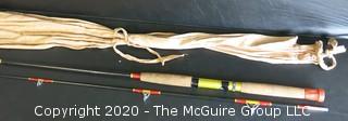 Vintage Fly Fishing rod with Rubber Grip by Davol, 85", with Cloth Covering Bag. 