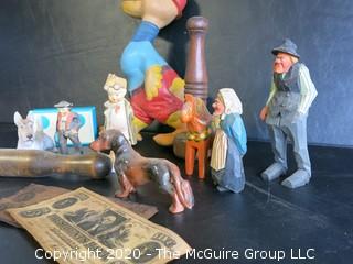 Group of Miscellaneous Items.  Includes Wood Juggling Pins, Carved Figures, Porcelain Figures, Faux Money and Large Duck Toy Made by Remple of Akron OH.