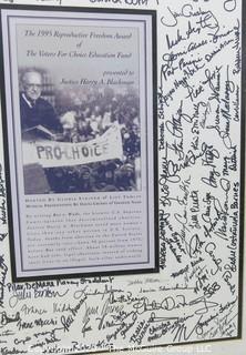 20 x 25" framed poster under glass of Award given to U.S. Supreme Court Justice Harry A. Blackman by Voters for Choice Education Fund; signed by attendees including celebrities