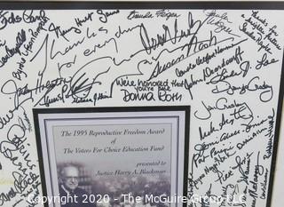 20 x 25" framed poster under glass of Award given to U.S. Supreme Court Justice Harry A. Blackman by Voters for Choice Education Fund; signed by attendees including celebrities