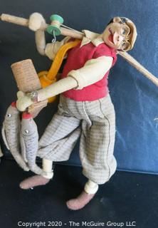 Two Vintage Klumpe-Roldan Dolls - Doctor and Fisherman.  Made in Spain.  Measures approximately 9." and 10 1/2" tall