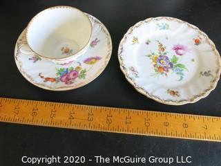 Partial Set of Dresden China China with Floral Decoration and Gold Gilt Edges.  