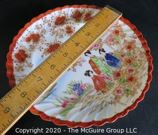 Vintage Asian Hand Painted Porcelain Plate.  Measures approximately 8" in diameter. Hairline Crack in Edge.  Please review photo.