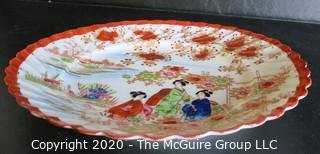 Vintage Asian Hand Painted Porcelain Plate.  Measures approximately 8" in diameter. Hairline Crack in Edge.  Please review photo.