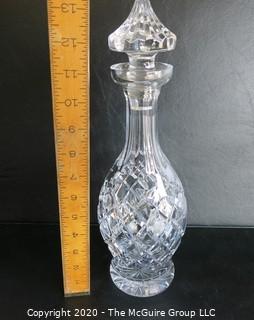 Cut Crystal Decanter with Stopper. Measures approximately 13" tall.