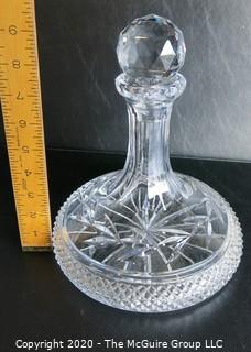 Crystal Decanter with Stopper. Measures approximately 9 1/2" x 8".