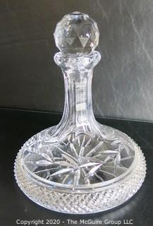 Crystal Decanter with Stopper. Measures approximately 9 1/2" x 8".