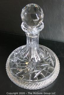 Crystal Decanter with Stopper. Measures approximately 9 1/2" x 8".