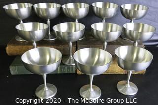 Set of 12 Pewter Champagne Coupes made by Colonial Pewter by Boardman JBC.  They Measure Approximately 4 1/2" tall.