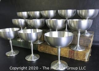 Set of 12 Pewter Champagne Coupes made by Colonial Pewter by Boardman JBC.  They Measure Approximately 4 1/2" tall.