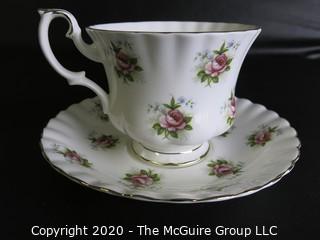 Porcelain Bone China Teacup and Saucer in Forget Me Not pattern made by Royal Albert in England.