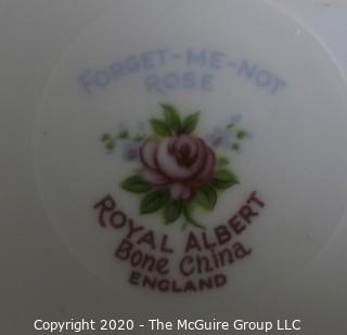 Porcelain Bone China Teacup and Saucer in Forget Me Not pattern made by Royal Albert in England.